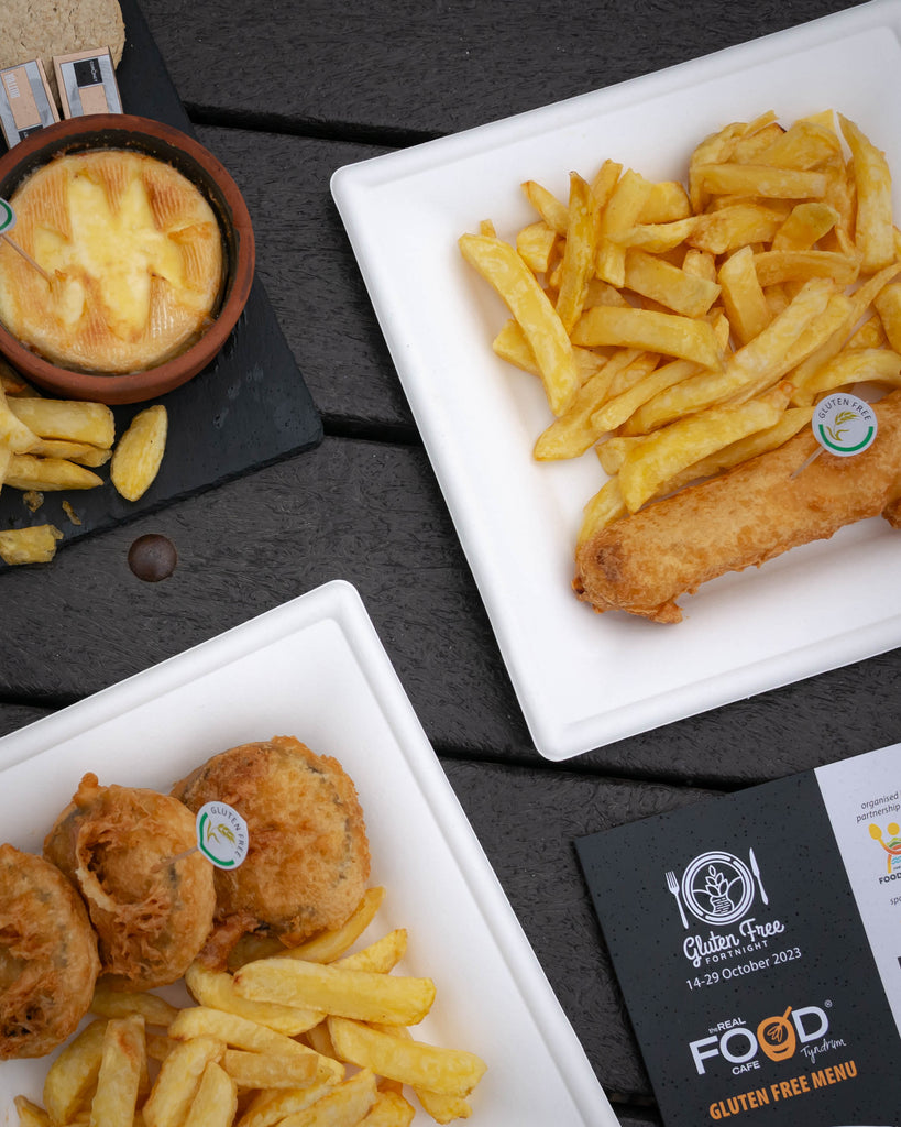 gluten free battered sausage and chips and gluten free black pudding and chips served at the real food cafe